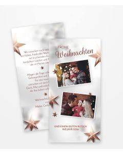 Weihnachtskarte mit goldfarbenen Sternen und zwei Fotos.